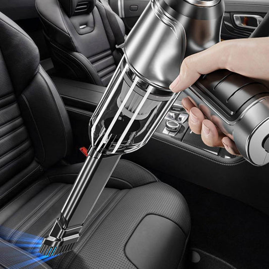 Handheld mini car vacuum cleaner removing dirt from leather seats with powerful suction.